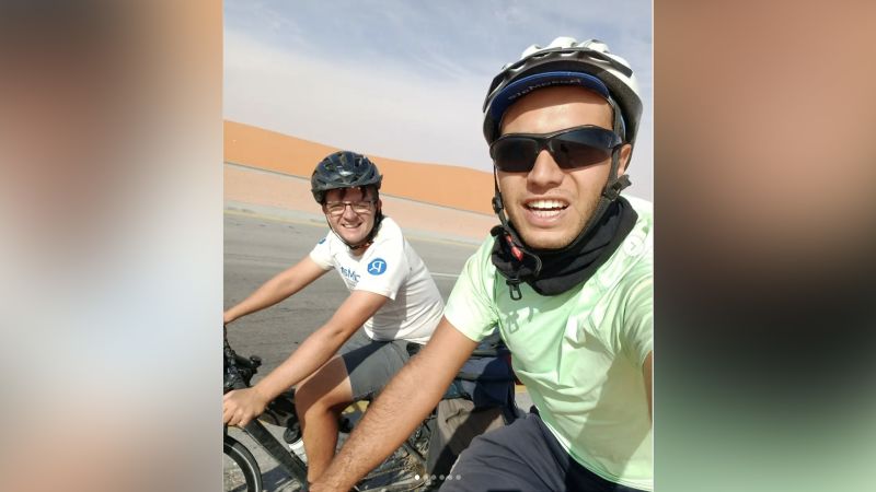Cycling from Paris to Doha to watch France at Qatar 2022 | CNN - NewsOpener