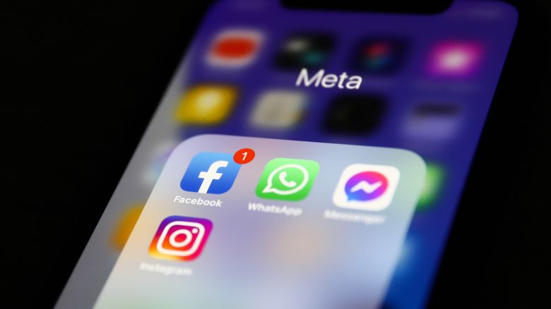 Facebook, WhatsApp, Messenger and Instagram icons displayed on a phone screen are seen in this illustration photo taken in Krakow, Poland on April 6, 2022.