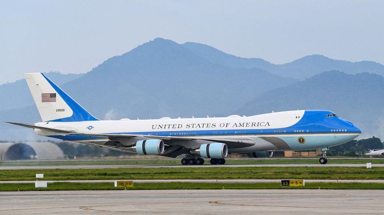 Air Force One landing in a 2023 photo. Boeing has moved up the planned delivery time of two 747 jets  to replace the two current jets. But the delivery will still come years after originally scheduled.