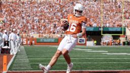 AUSTIN, TEXAS - SEPTEMBER 13: Arch Manning #16 of the Texas Longhorns scores a touchdown in the first quarter against the UTEP Miners at Darrell K Royal-Texas Memorial Stadium on September 13, 2025 in Austin, Texas.