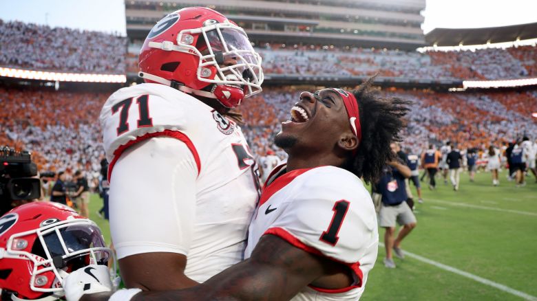 KNOXVILLE, TENNESSEE - SEPTEMBER 13: Zachariah Branch #1 of the Georgia Bulldogs celebrates Earnest Greene III #71 after the 44-41 OT win over the Tennessee Volunteers at Neyland Stadium on September 13, 2025 in Knoxville, Tennessee. (Photo by Andy Lyons/Getty Images)