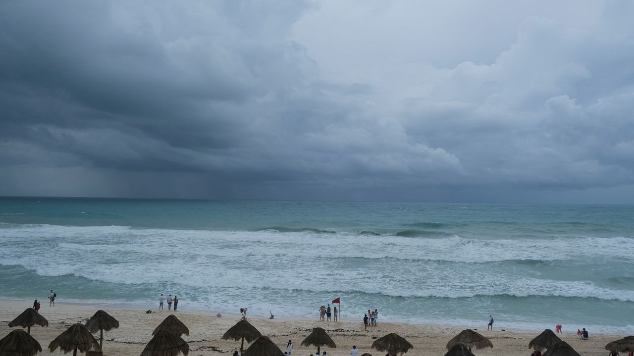 Storm clouds are seen on the horizon as Potential Tropical Storm One causes rainfall and flooding in Cancun, Mexico, on June 18. 