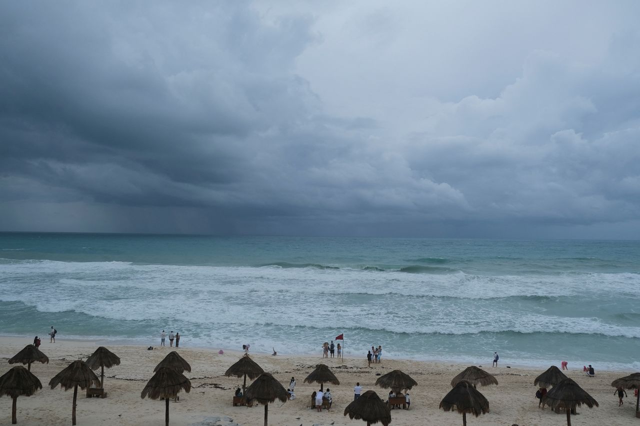 Storm clouds are seen on the horizon as Potential Tropical Storm One causes rainfall and flooding in Cancun, Mexico, on June 18. 