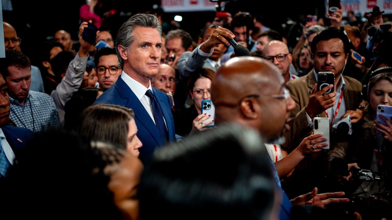 Gov. Gavin Newsom appears with a group of fellow democrats to speak to reporters in the spin room following the CNN Presidential Debate between President Joe Biden and former President Donald Trump at the McCamish Pavilion on the Georgia Institute of Technology campus on June 27 in Atlanta.