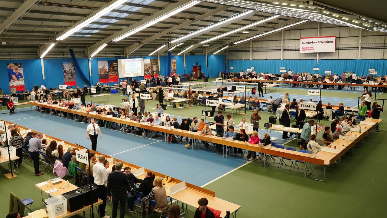 Election workers are seen in Sunderland, northern England, on Thursday July 4.