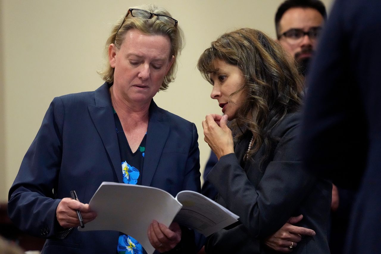 Special prosecutors Kari Morrissey, left, and Erlinda Johnson speak in court on July 10, in Santa Fe, New Mexico. 