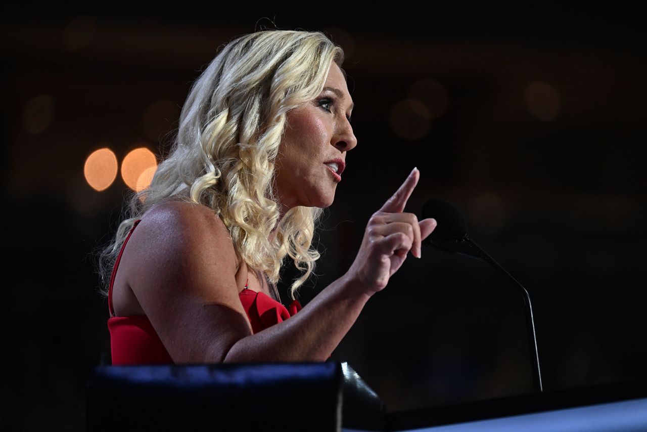 Rep. Marjorie Taylor Greene speaks from the stage during the convention on Monday, July 15.