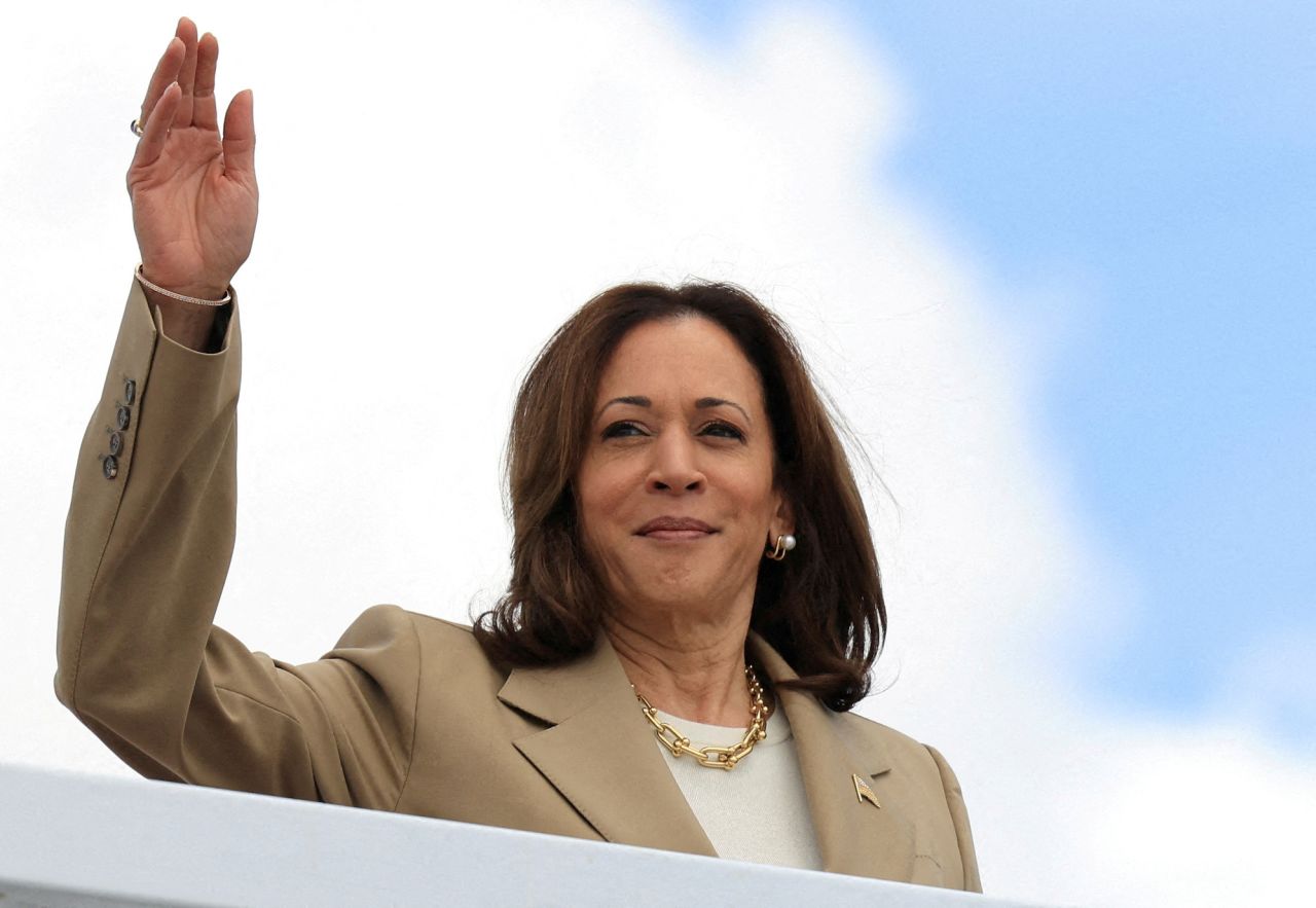 Vice President Kamala Harris waves as she boards Air Force Two at Joint Base Andrews in Maryland on July 13.