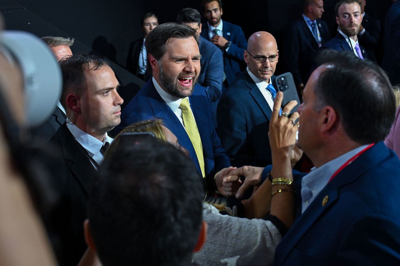 JD Vance shakes hands with a delegate during second day of the Republican National Convention  in Milwaukee on Tuesday, July 16. 