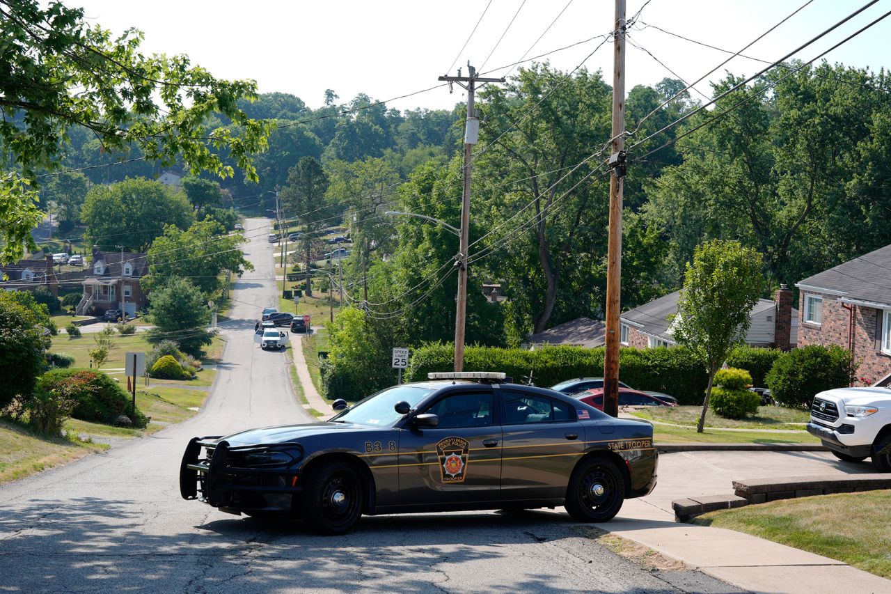 Law enforcement block a street near the residence of Thomas Matthew Crooks in Bethel Park, Pennsylvania, on Sunday, July 14.