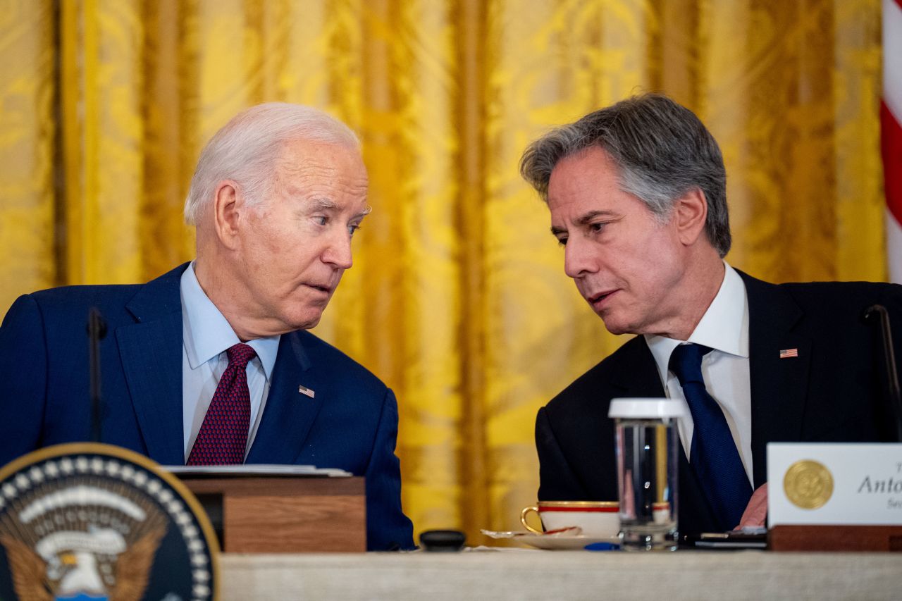 President Joe Biden speaks with Secretary of State Antony Blinken during a meeting in the East Room of the White House in April.