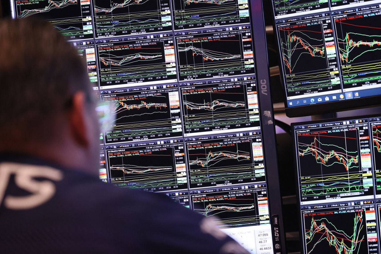 A trader works on the floor of the New York Stock Exchange in January.