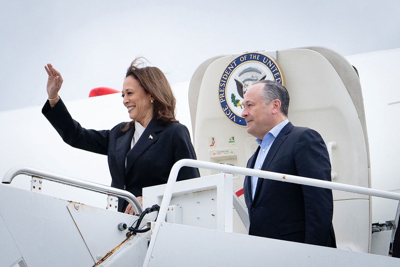 Vice President Kamala Harris and second gentleman Douglas Emhoff descend from Air Force Two at Delaware National Air Guard base in New Castle, Delaware, on Monday, July 22.