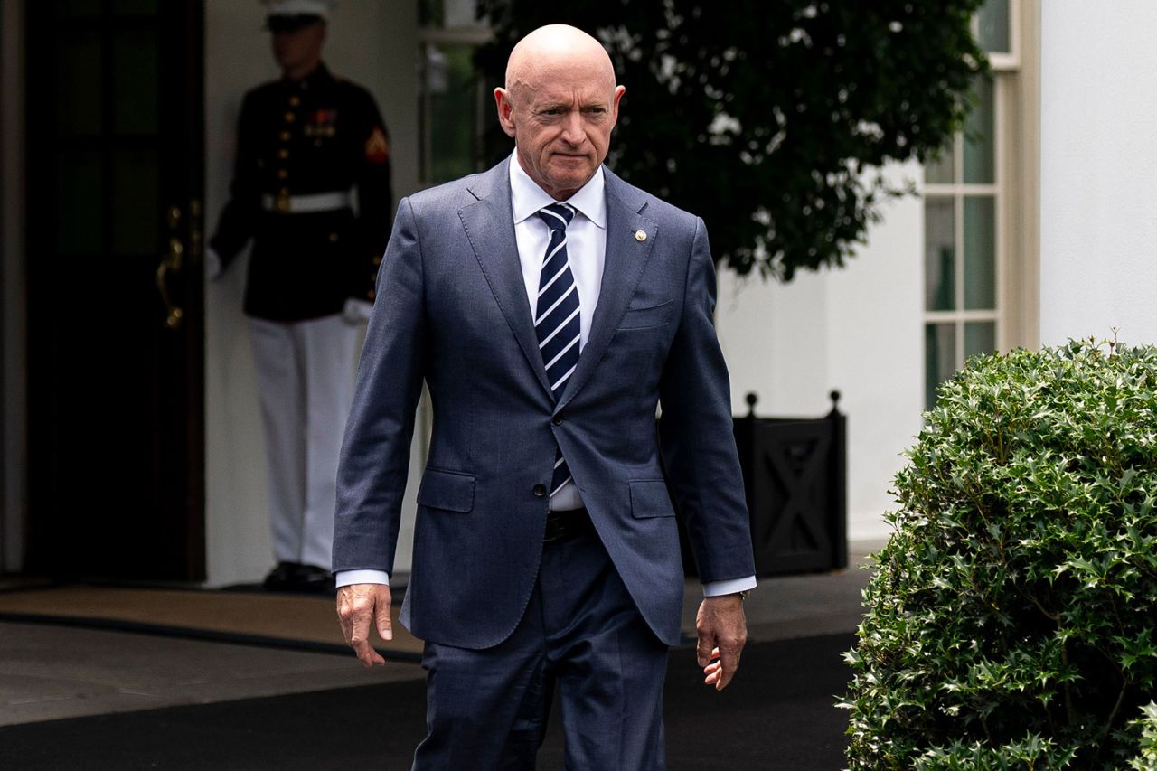 Sen. Mark Kelly outside of the West Wing of the White House on June 4. 