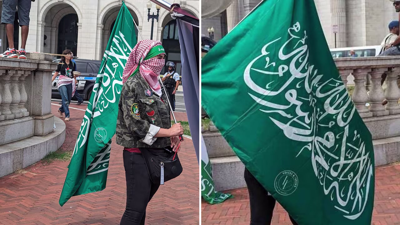 A protestor carries a Hamas flag during the protests on Wednesday.