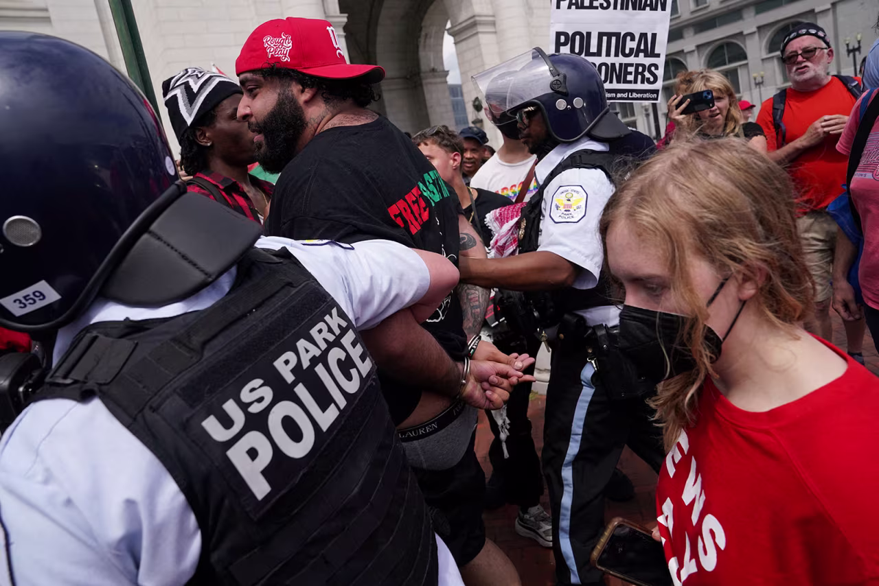 Police officers detain a pro-Palestinian protester in Washington, DC, on Wednesday, July 24.