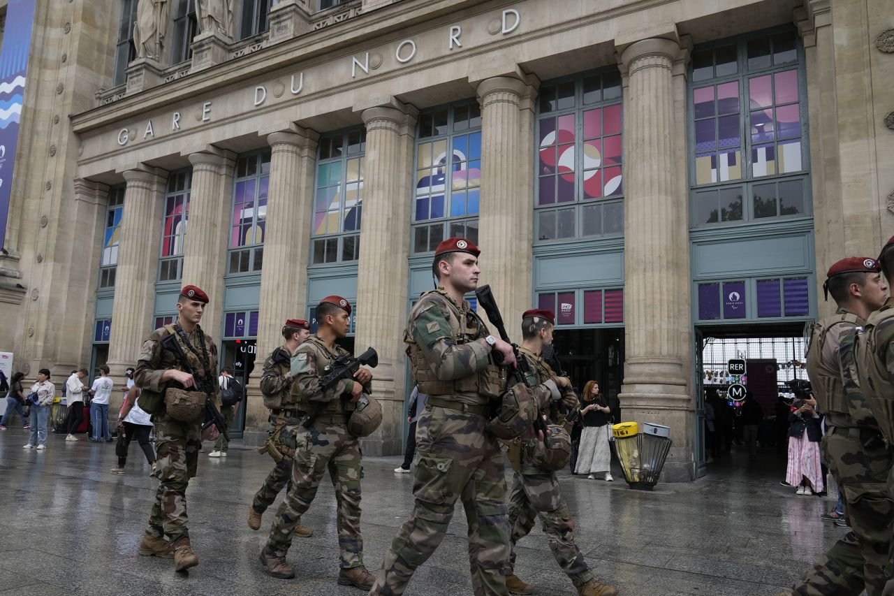 Soldiers patrol outside Gare du Nord train station in Paris, France, on July 26. 