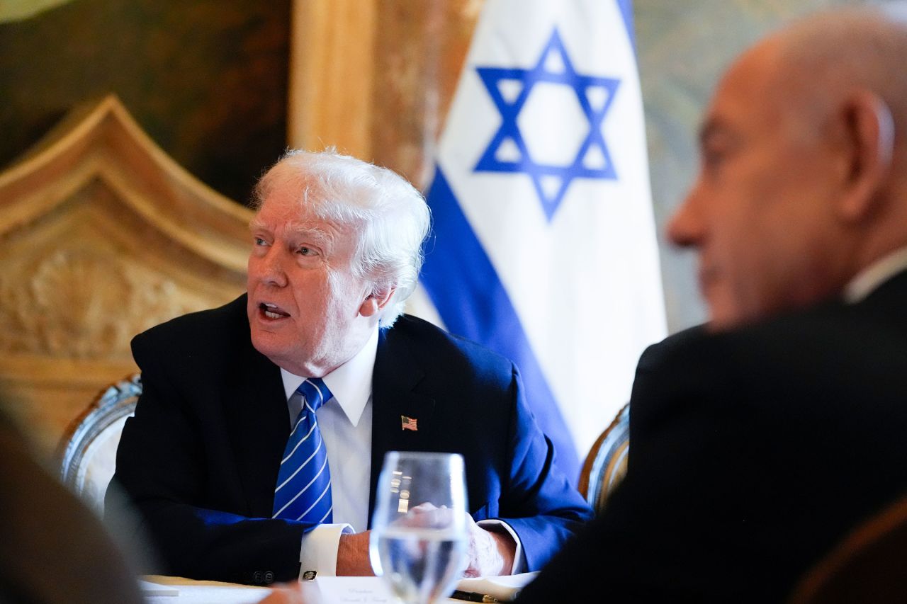 Former President Donald Trump meets with Israeli Prime Minister Benjamin Netanyahu at his Mar-a-Lago estate on Friday in Palm Beach, Florida. 