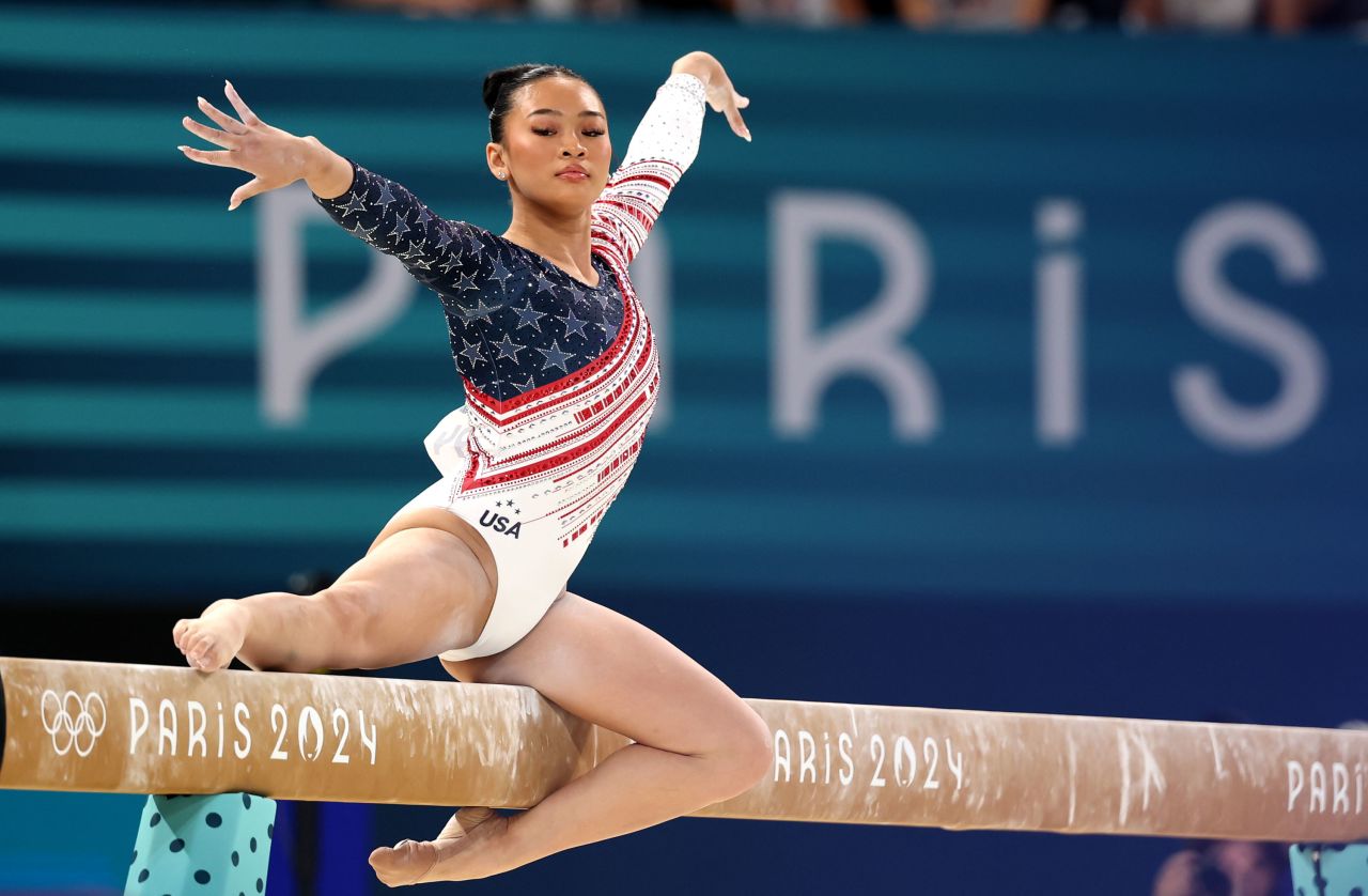 Suni Lee competes on the balance beam on Tuesday.