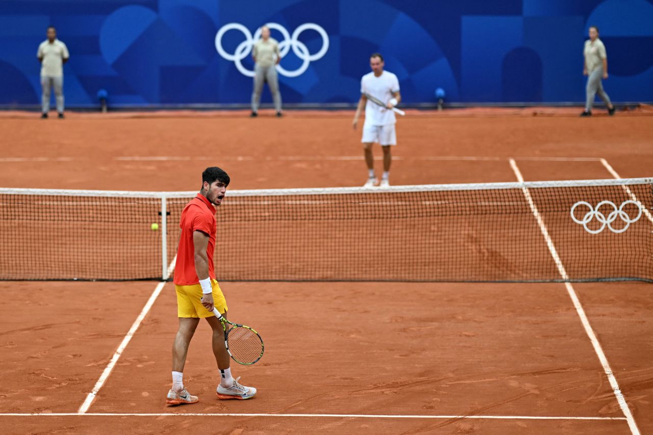 Carlos Alcaraz celebrates his win against Roman Safiullin on Court Suzanne-Lenglen at the Roland-Garros Stadium on Tuesday.