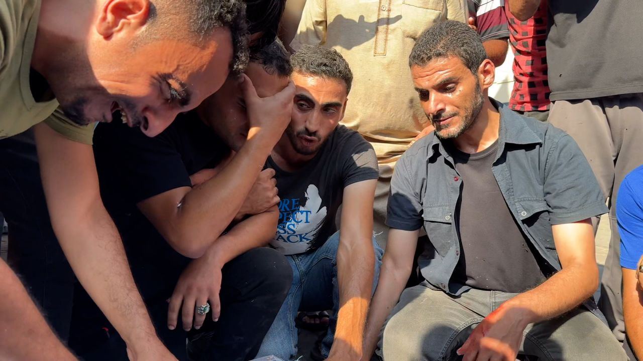 Relatives mourn family members killed in an Israeli airstrike, outside a hospital in Deir al-Balah, Gaza, on August 1.