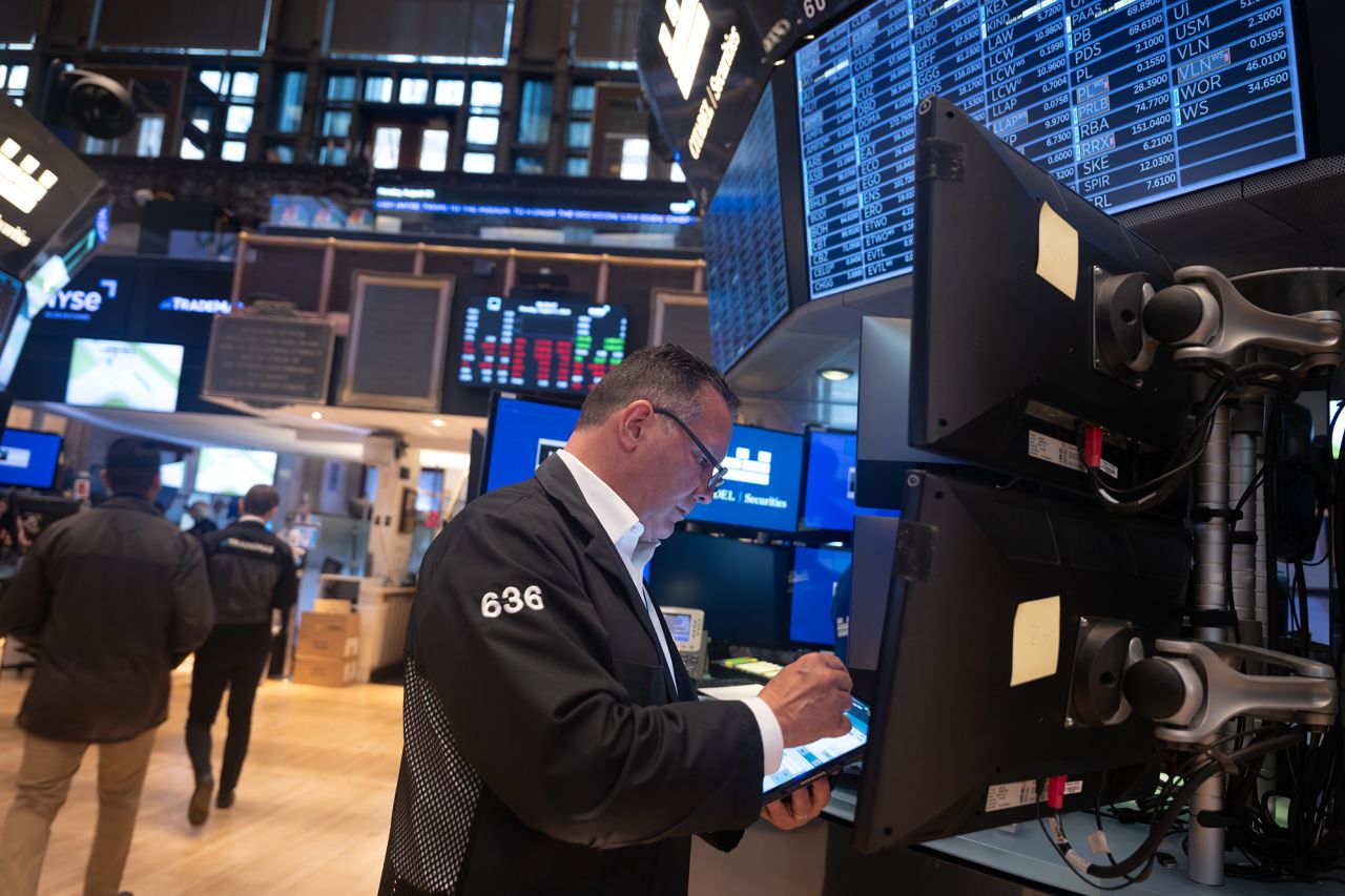 Traders work on the floor of the New York Stock Exchange (NYSE) on August 5.