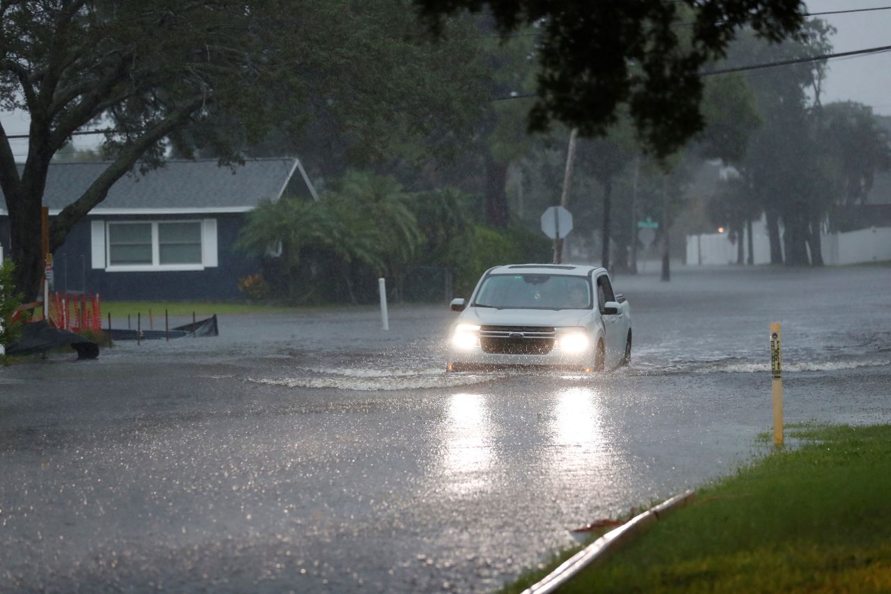 A truck drives through high water in St. Petersburg, Florida, on August 4. 