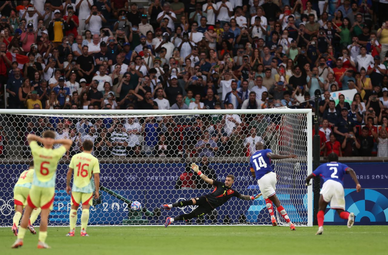 Jean-Philippe Mateta of France scores their third goal from the penalty spot.