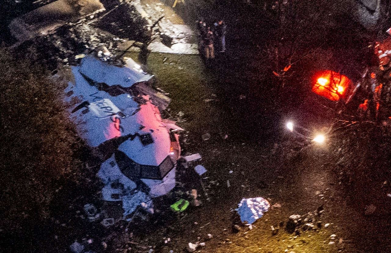 Emergency personnel work close to the wreckage of the crashed plane in Vinhedo, Sao Paulo State, Brazil, on Friday, August 9.