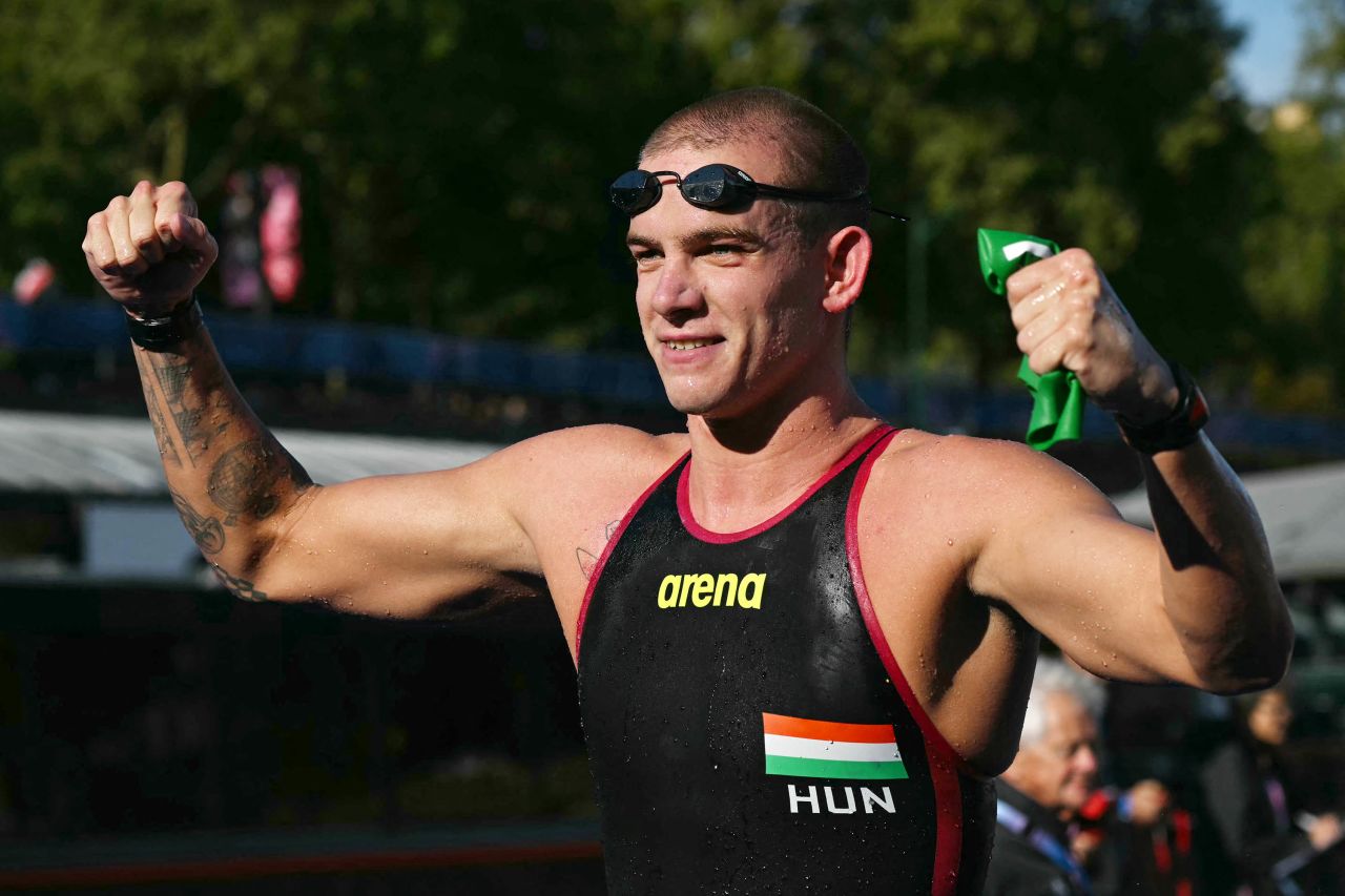 Hungary's Kristof Rasovszky celebrates after winning the men's 10k marathon swimming final on August 9. 