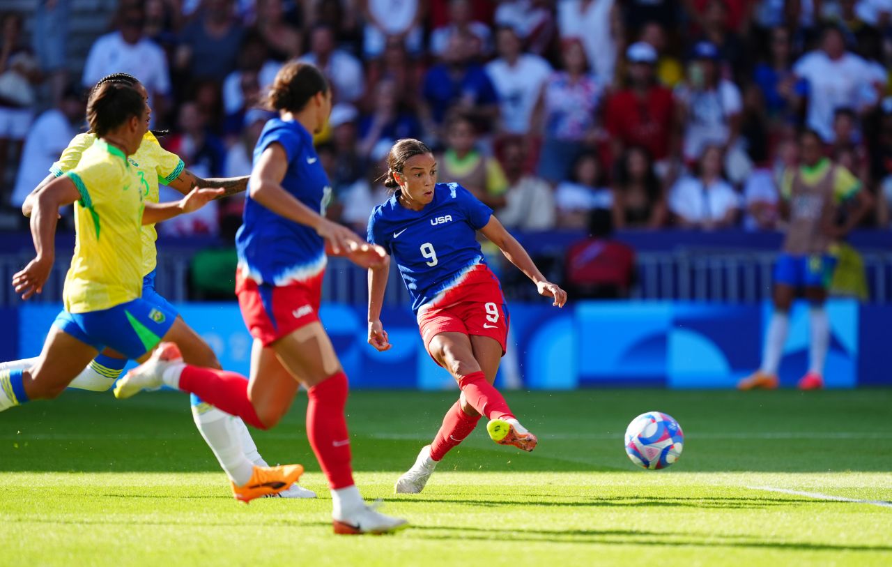 USA's Mallory Swanson scores a goal against Brazil on August 10. 