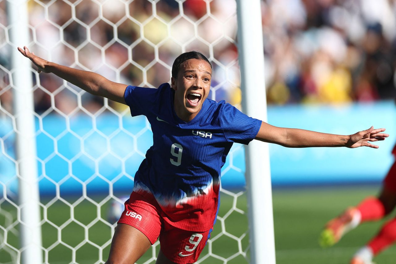 USA’s Mallory Swanson celebrates scoring the opening goal against Brazil in the women’s soccer gold medal match on August 10. 