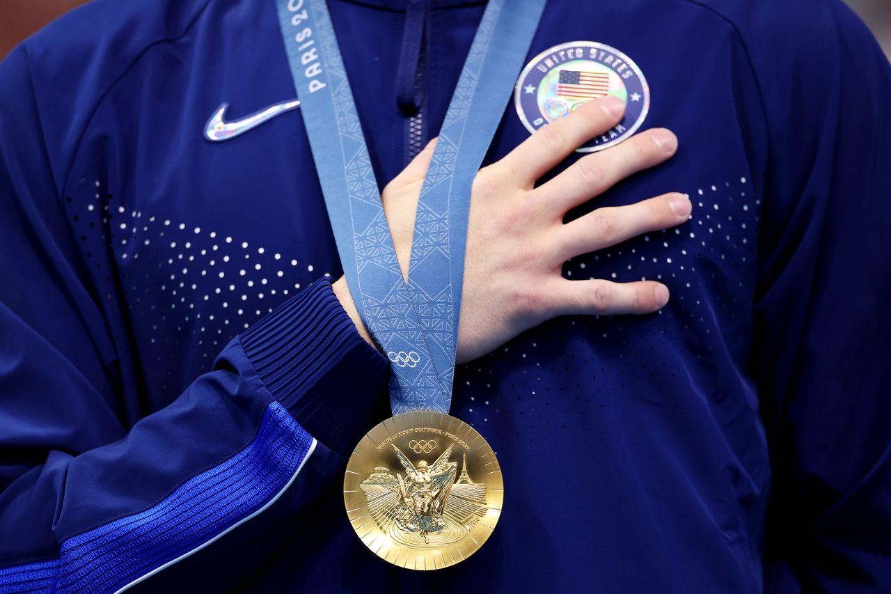 American swimmer Bobby Finke wears his gold medal after winning the men’s 1500-meter freestyle on August 4. 