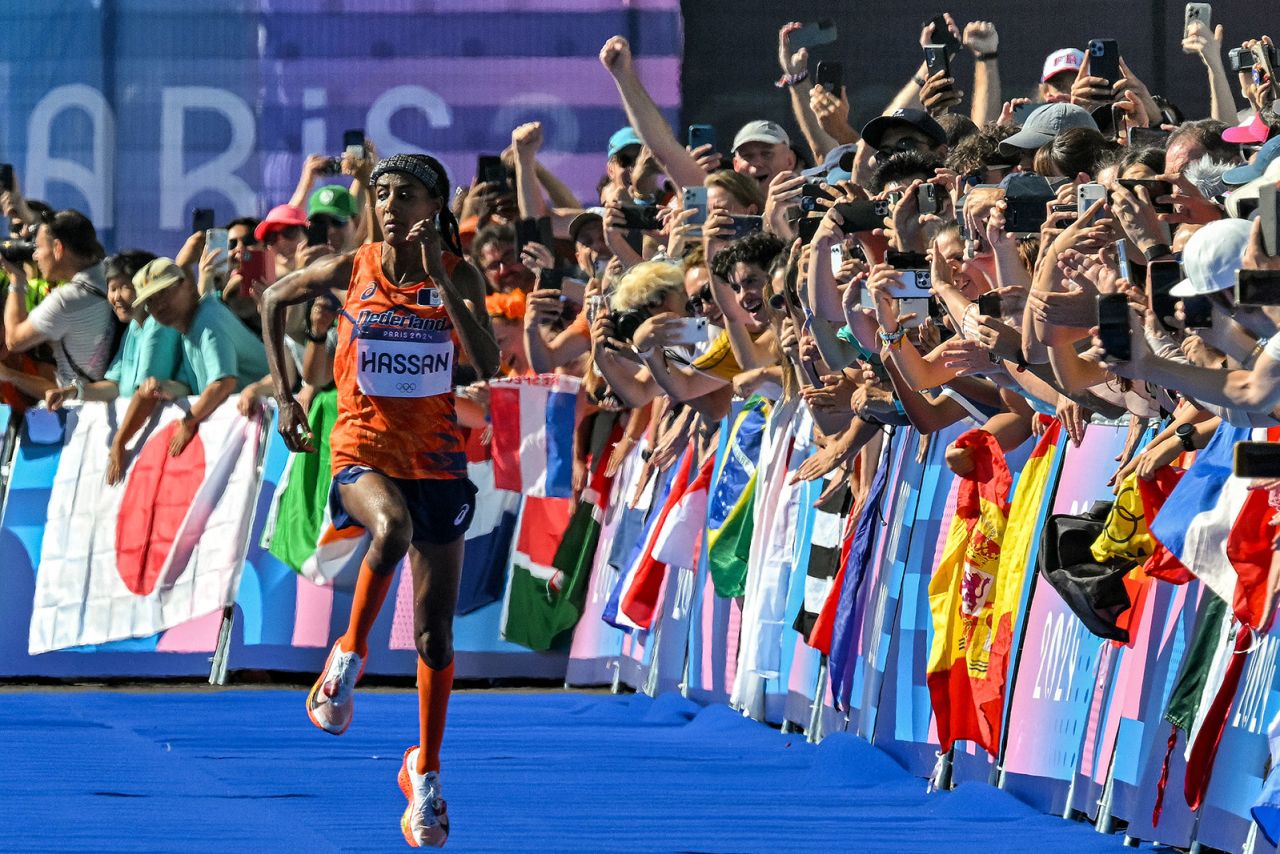 Netherlands' gold medallist Sifan Hassan sprints to cross the finish line in the women's marathon on August 11.