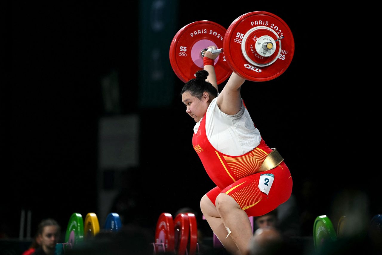 China's Li Wenwen competes in the women's +81kg weightlifting event on Sunday, August 11. 