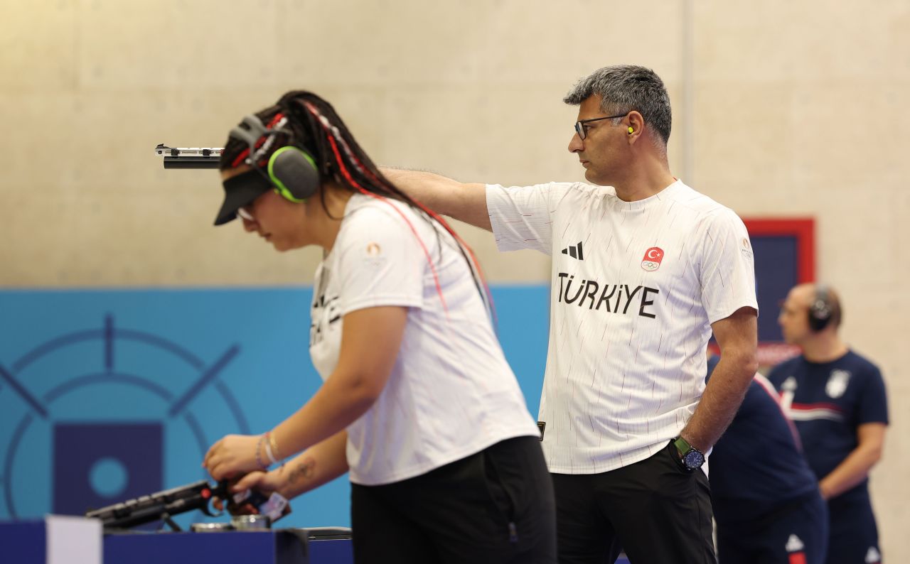 Turkey's Yusuf Dikeç competes in the 10-meter air pistol mixed-team shooting competition on July 30.