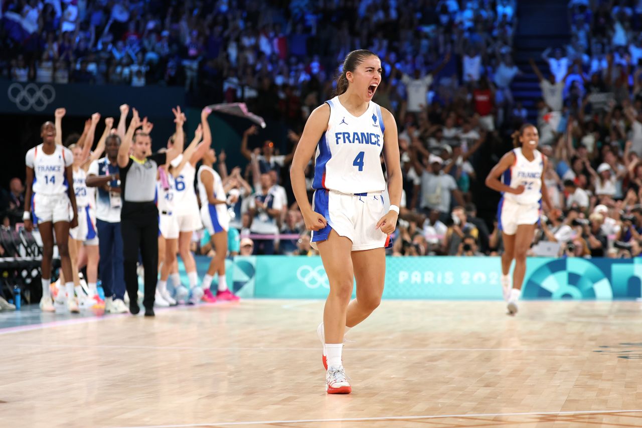 French basketball player Marine Fauthoux reacts after a three-point basket during a game against the United States on August 11.