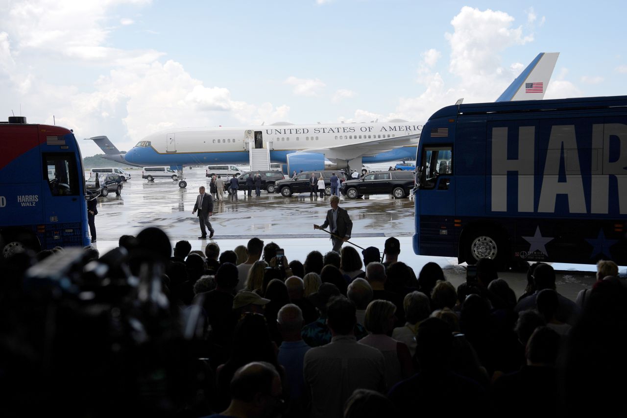 Supporters look on as Air Force Two with Vice President Kamala Harris on board arrives in Pittsburgh on August 18.