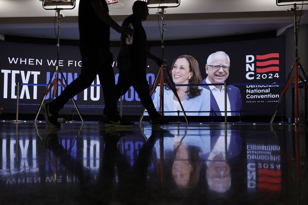 Images of Vice President Kamala Harris and Minnesota Gov. Tim Walz are shown on a video wall inside the United Center in Chicago on August 17.