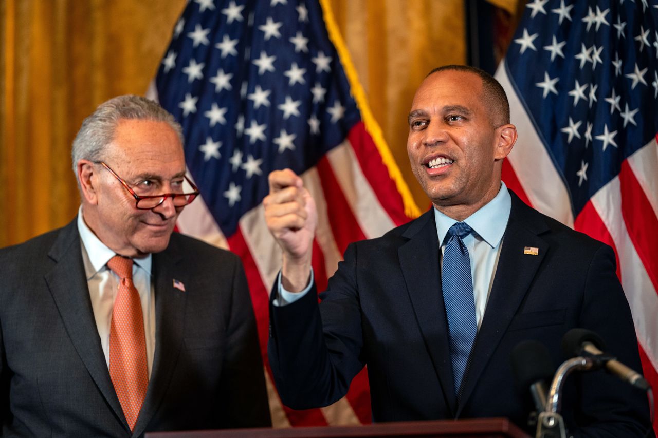 House Minority Leader Hakeem Jeffries speaks as Senate Majority Leader Chuck Schumer looks on, at a news conference on July 23, in Washington, DC.