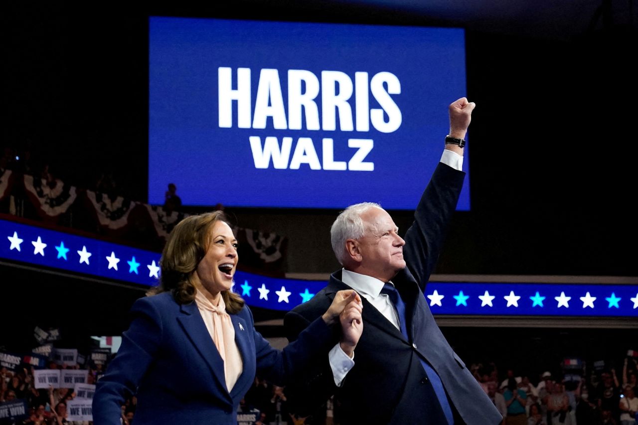 Vice President Kamala Harris and her running mate Minnesota Governor Tim Walz react as they hold a campaign rally in Philadelphia, Pennsylvania, on August 6.