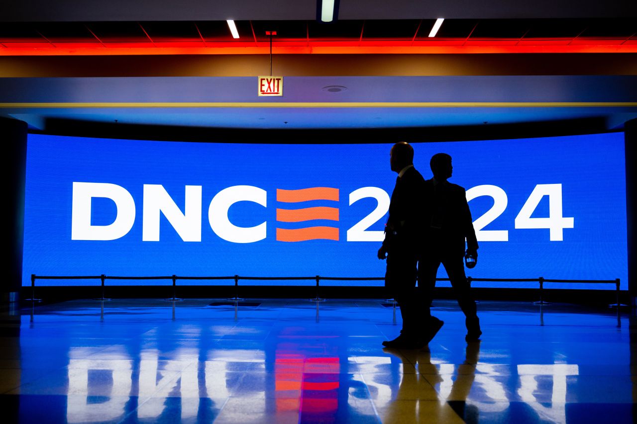 Security officials walk through the United Center in Chicago during preparations ahead of the Democratic National Convention on Sunday.