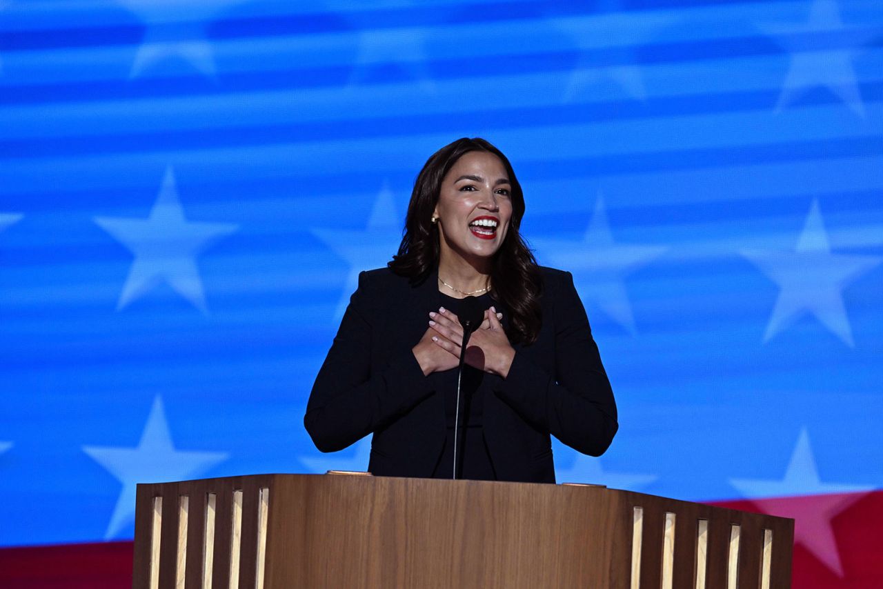 New York Rep. Alexandra Ocasio-Cortez speaks from the stage during the opening night of the DNC on Monday, August 19, in Chicago.