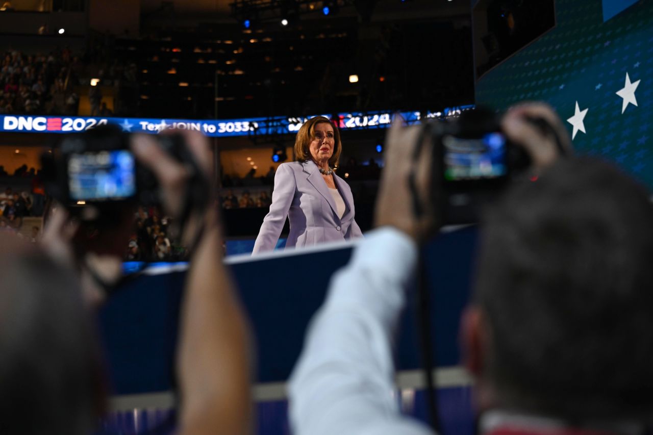 Former House Speaker Nancy Pelosi walks on stage to give a speech on Wednesday. "We must choose leaders who believe in free and fair elections, who respect the peaceful transfer of power,”?Pelosi said. “The choice couldn’t be clearer. Those leaders are Vice President Kamala Harris and Gov. (Tim) Walz.”