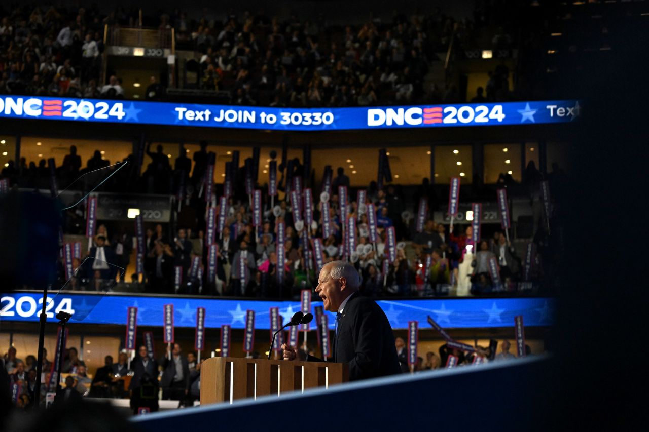 Democratic vice presidential nominee Minnesota Governor Tim Walz speaks at the United Center during the Democratic National Convention in Chicago, Illinois, on August 21