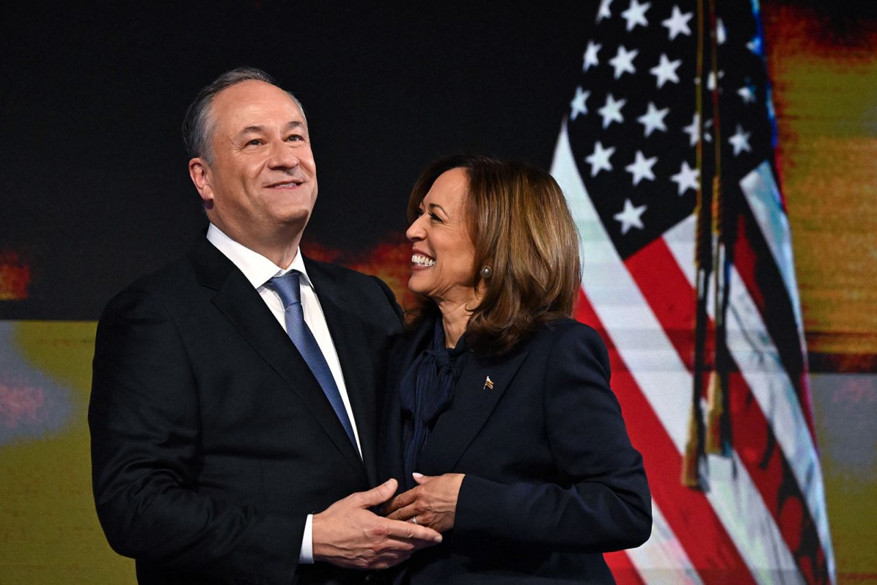 Vice President Kamala Harris and Second Gentleman Doug Emhoff celebrate together after Harris's speech at the Democratic National Convention on August 22. 