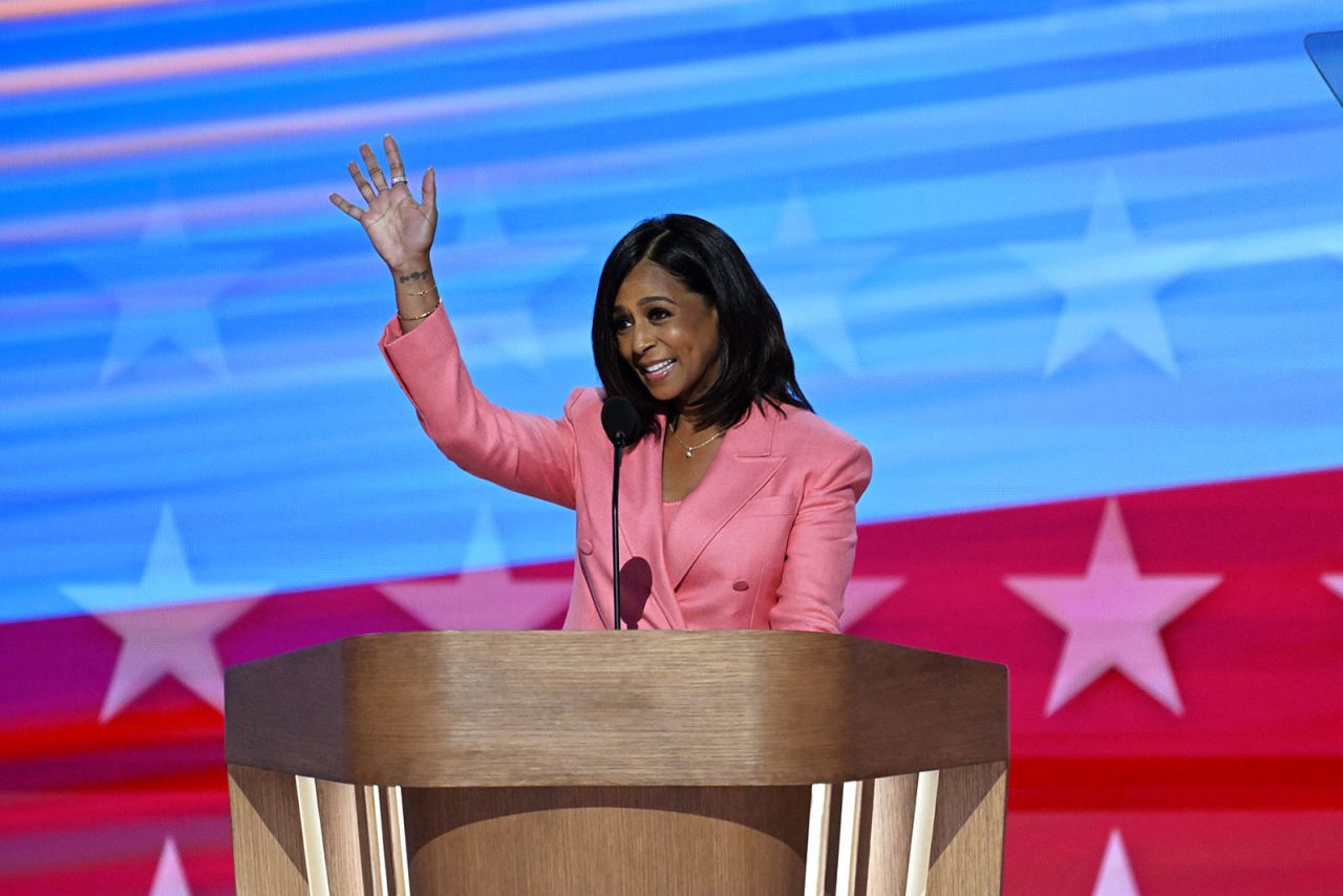 Maya Harris waves on stage during the Democratic National Convention in Chicago, on Thursday, August 22.