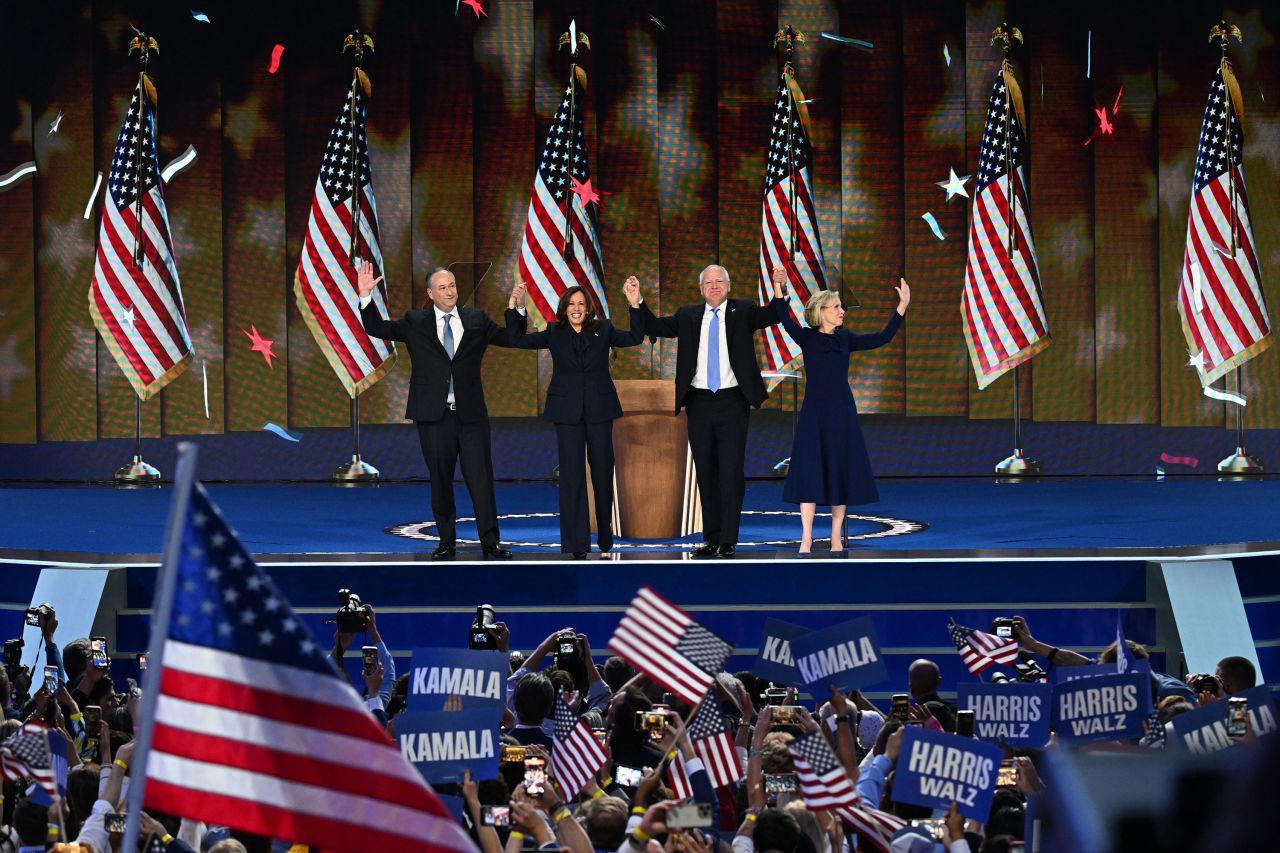 Vice President Kamala Harris and Minnesota Gov. Tim Walz are joined by their spouses onstage on the final day of the 2024 Democratic National Convention in Chicago on Thursday, August 22. 