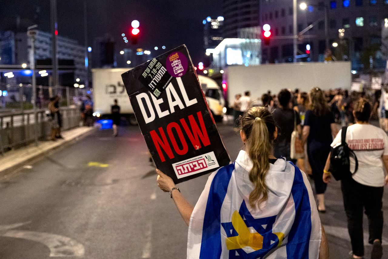 Protesters attend a demonstration calling for a hostage deal?on August 24, in Tel Aviv, Israel. 