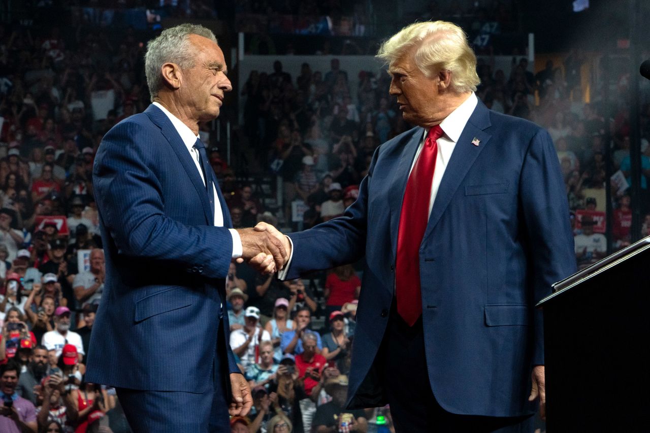 Robert F. Kennedy Jr. joins Donald Trump onstage at a rally in Glendale, Arizona, on August 23. 